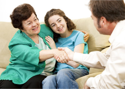 Mother and Doctor handshake